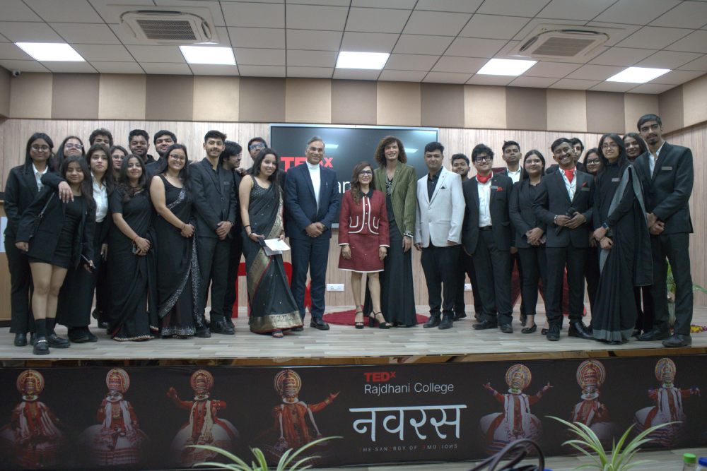 Manoj Gupta on TEDx Stage at Rajdhani College, Delhi with Students and Organizers